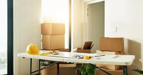 Interior design, tools and boxes in new home for renovation, planning and t.. Stock Photos