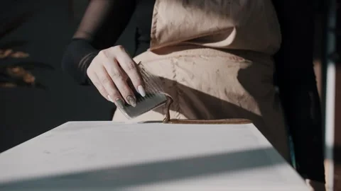 Interior designer begins by creating a unique painting using epoxy resin. To do Stock Footage 277233522