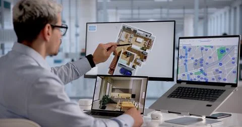 Interior Designer Creating A 3D Home Model With CAD Software In Office Enviro Stock Photos