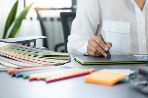 Interior designer or creative graphic designer working on project architectur Stock Photos