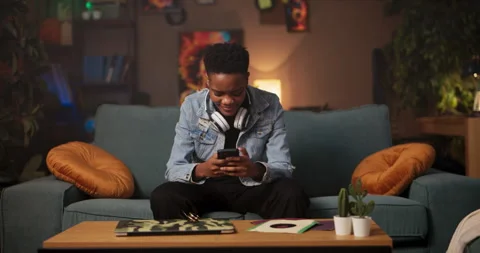 Interior designer or decorator African woman in the living room, creating Stock Footage 245143761