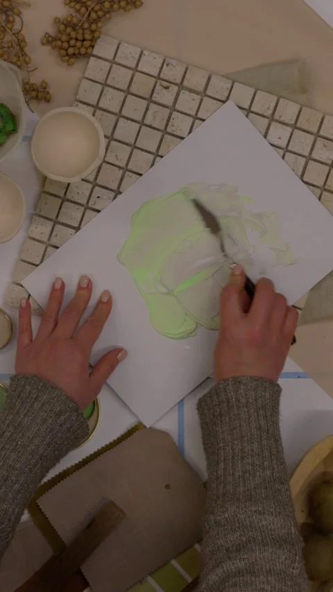 Interior designer selecting green and earthy color swatches for natural mood boa Stock Footage 329827668