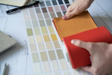 The interior designer selects fabrics and marble samples. Designer at work Stock Photos