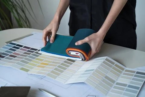 The interior designer selects fabrics and marble samples. Designer at work Stock Photos