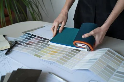 The interior designer selects fabrics and marble samples. Designer at work Stock Photos