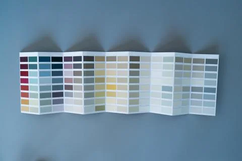 The interior designer selects wall paint samples. Designer at work. Interior Stock Photos