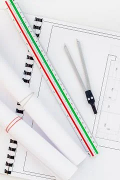 Interior designer table workplace with house plan Stock Photos