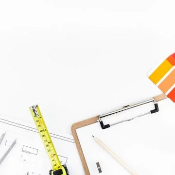 Interior designer table workplace with house plan Stock Photos