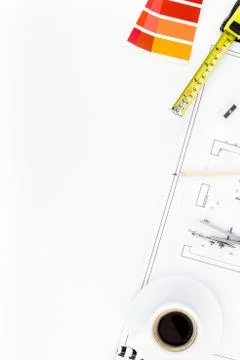 Interior designer table workplace with house plan Stock Photos