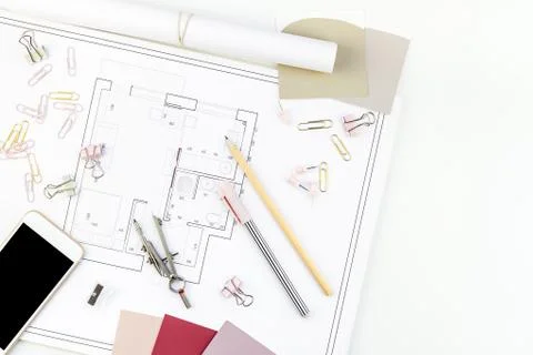 Interior designer table workplace with house plan Foto stock
