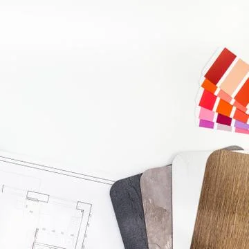 Interior designer table workplace with house plan Stock Photos