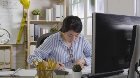 Interior designer using pencil and ruler drawing Video stock 102352072