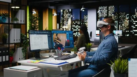 Interior designer using virtual reality headset to create a floor plan Foto stock