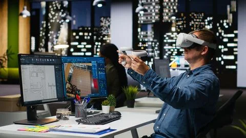 Interior designer using virtual reality headset to create a floor plan Stock Photos