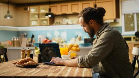Interior designer working on architectural CAD software on laptop Stock Photos