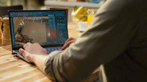 Interior designer working on architectural CAD software on laptop Stock Photos