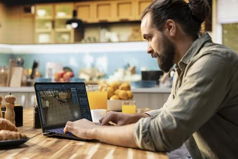 Interior designer working on architectural CAD software on laptop Stock Photos