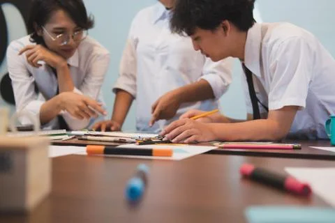 Interior designer working with graphic tablet at workplace. artist discussing Stock Photos