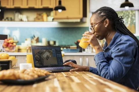 Interior designer working on new floor plan with architectural software Stock Photos