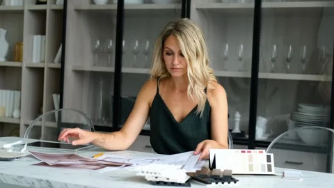 Interior designer working at workplace Video stock 285576632