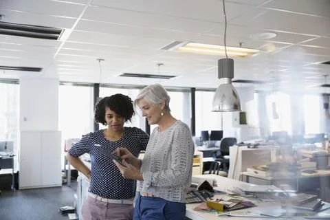 Interior designers using digital tablet in office Stock Photos