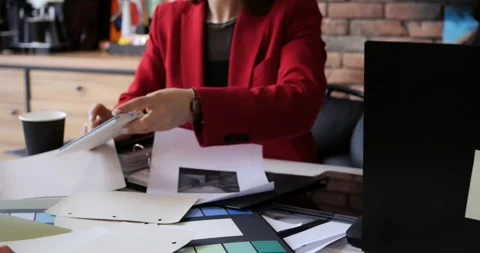 Interior designers working on design projects. Design planning with swatches Stock Footage 275500838