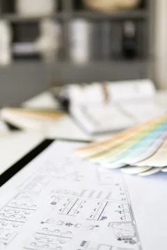 Interior designer's working table, an architectural plan of the house, a color 스톡 사진