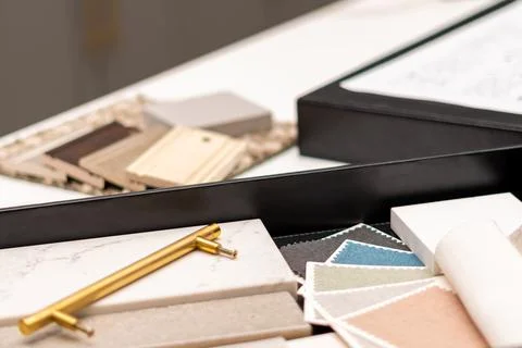 Interior designer's working table, an architectural plan of the house, a color Stock Photos
