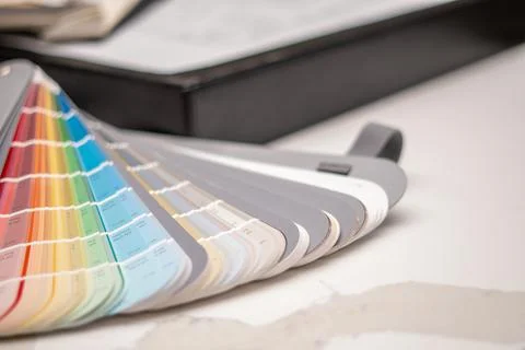 Interior designer's working table, an architectural plan of the house, a color Stock Photos
