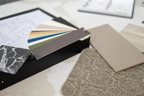 Interior designer's working table, an architectural plan of the house, a color Stock Photos