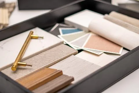 Interior designer's working table, an architectural plan of the house, a color Stock Photos