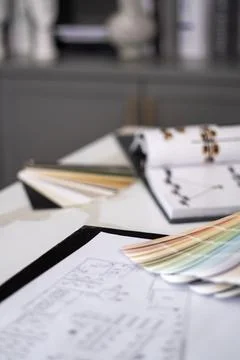 Interior designer's working table, an architectural plan of the house, a color 스톡 사진
