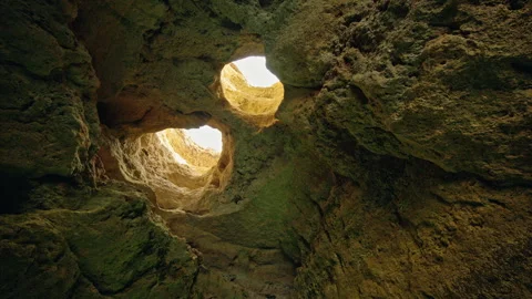 Interior of Devils Eyes Cave on the Algarve coast of Portugal Stock Footage 340921773