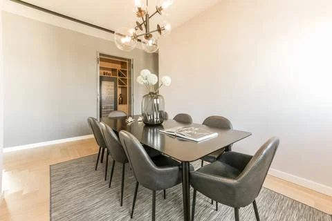 Interior of dining room in modern flat Stock Photos