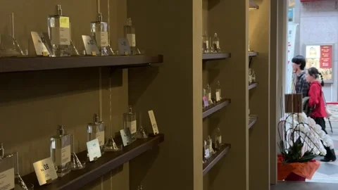 Interior display shelves of a boutique specialty perfume shop in Osaka Japan Stock Footage 345803460