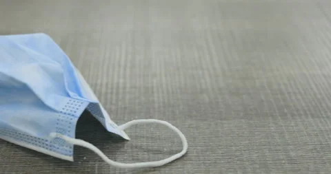 Interior, dolly left, table, surgical mask, hand, swat, fatigue Stock Footage 236881845