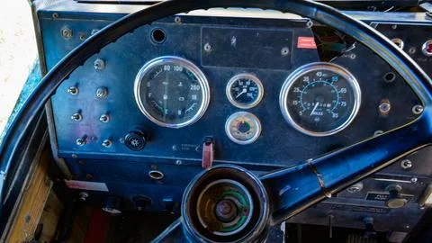 Interior of the driver's compartment featuring the steering wheel and contr.. Stock Photos