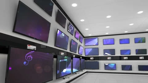 Interior of electronics store with synchronized video playing on screens of Stock Footage 157902410