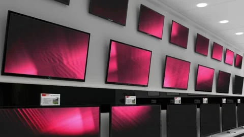 Interior of electronics store with synchronized video playing on screens of Stock Footage 157908212
