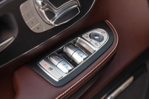The interior elements of a new expensive business Mercedes V-class car inside Stock Photos