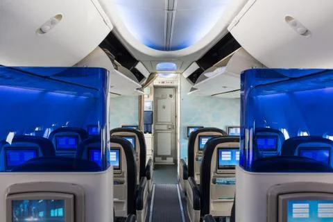 Interior of empty aircraft cabin Stock Photos