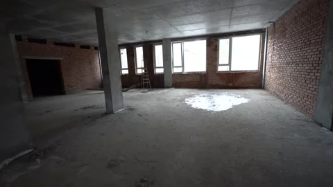 Interior of Empty Commercial Building Under Construction,. Camera Pan of Vidéo 334039954