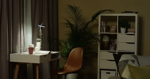 Interior of the empty cozy corner in the living room with a desk and other 스톡 동영상 104981969