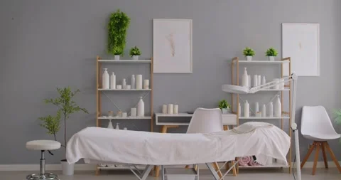 Interior of empty cozy spa salon office ready to accept client for beauty Stock Footage 314782738