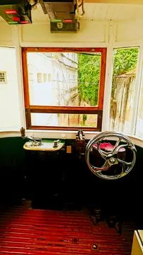Interior of an empty driver room, or cockpit, of the typical tram with equipment Stock Photos
