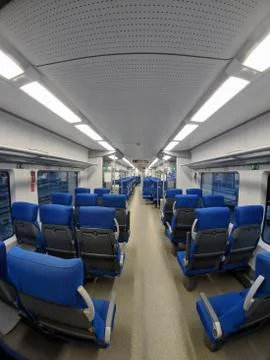 Interior of empty passenger carriage in the new Russian rapid transport train Foto stock