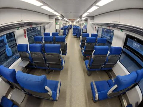 Interior of empty passenger carriage in the new Russian rapid transport train Stock Photos