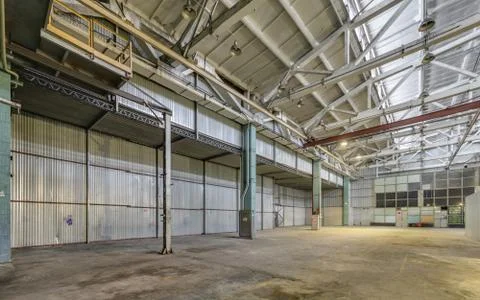 The interior of an empty production hall. Stock Photos