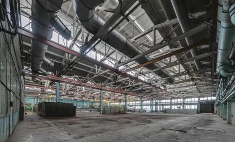 The interior of an empty production hall. Stock Photos