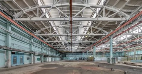 The interior of an empty production hall. Stock Photos